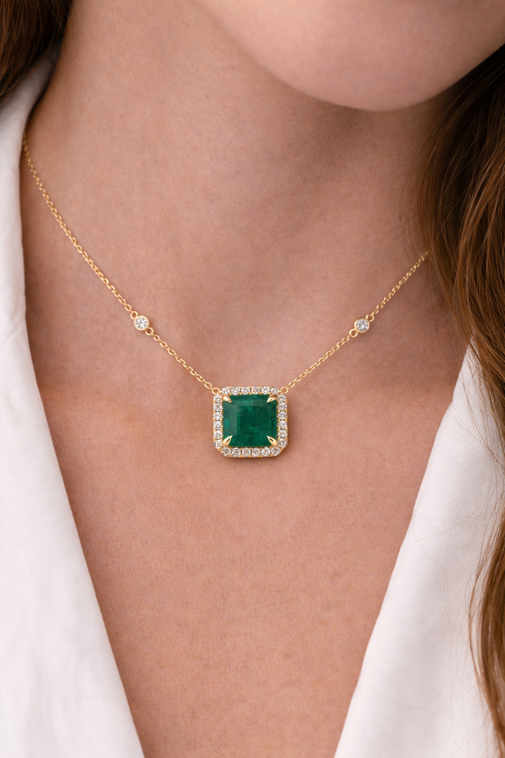 Yellow Gold Emerald and Diamond Halo Necklace