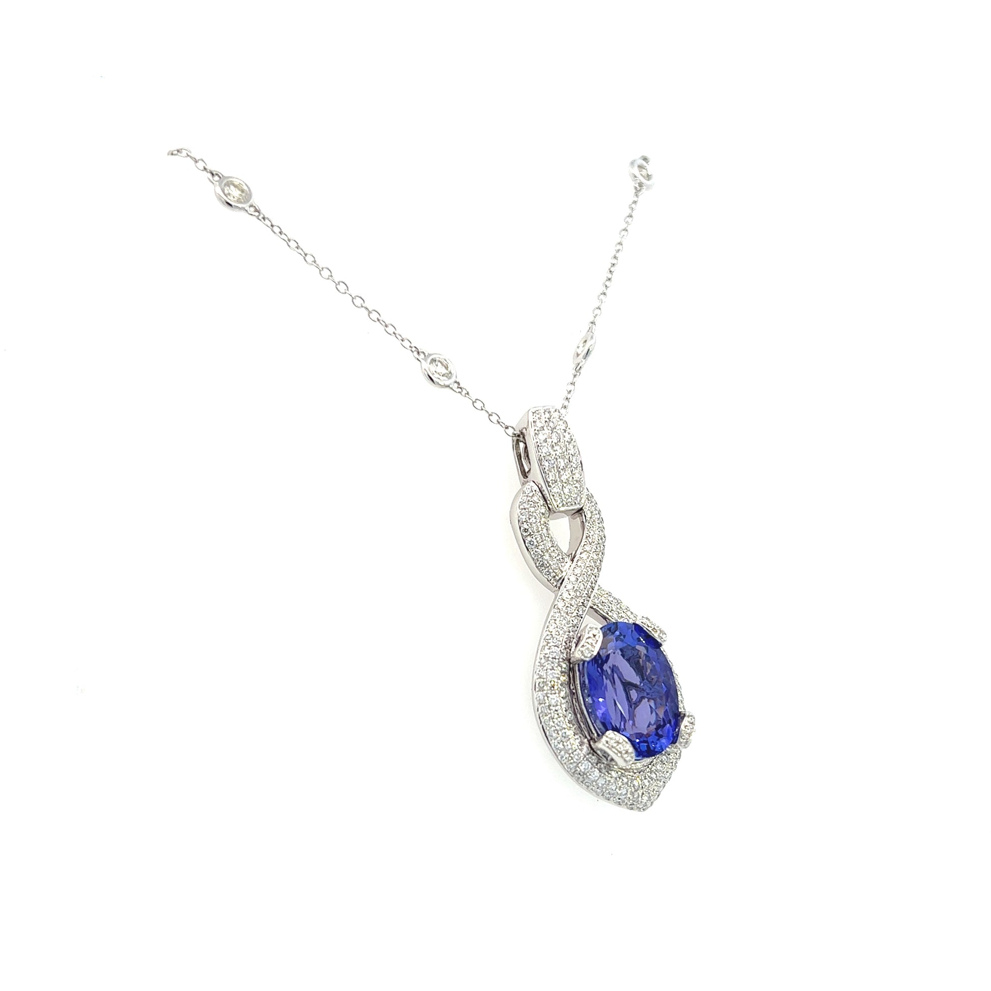 18K White Gold Oval Tanzanite And Pave Diamond Necklace (6.17ctw)