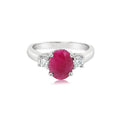 14K White Gold Oval Ruby And Diamond Three Stone Ring (2ctw)