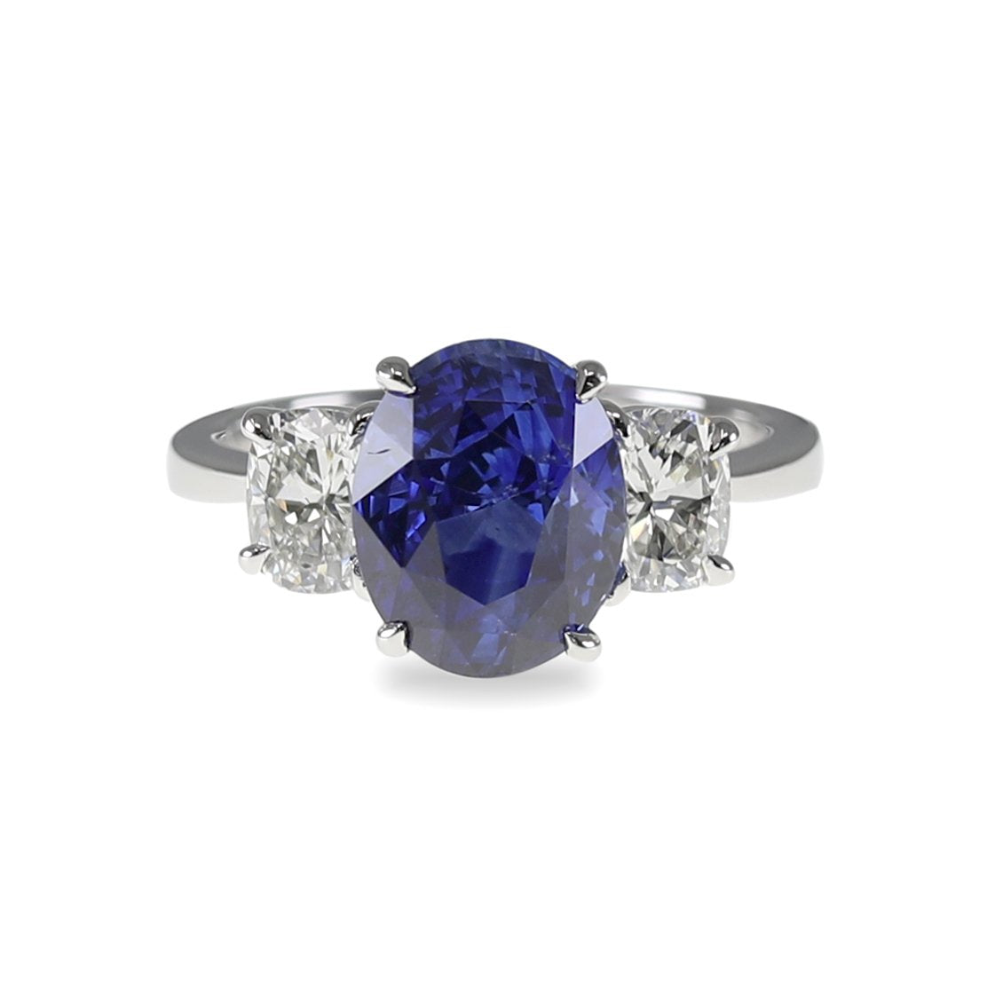 Platinum Oval Sapphire and Cushion Diamond Three Stone Ring (5.15ctw)