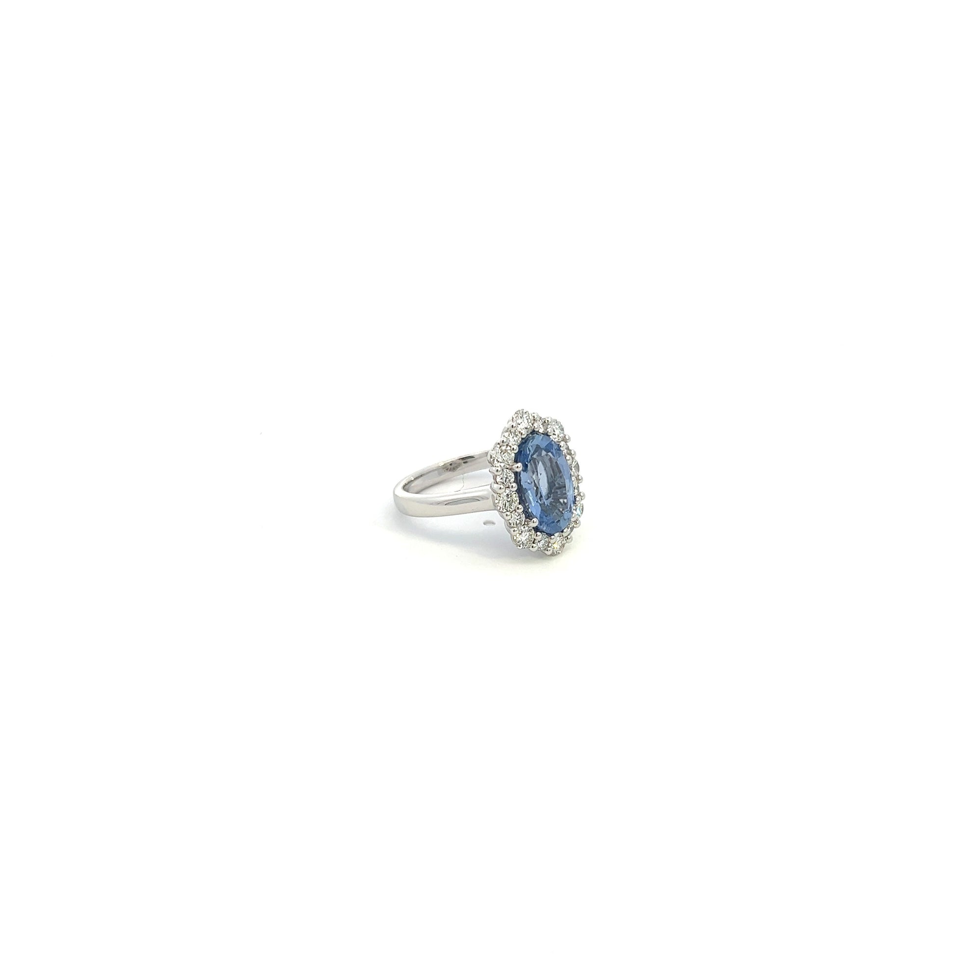 Platinum Oval Sapphire And Diamond Halo Ring (4.48ctw)