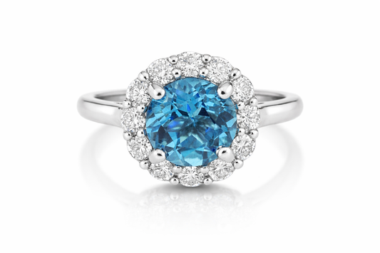 White Gold Blue Topaz Ring With Diamond Halo