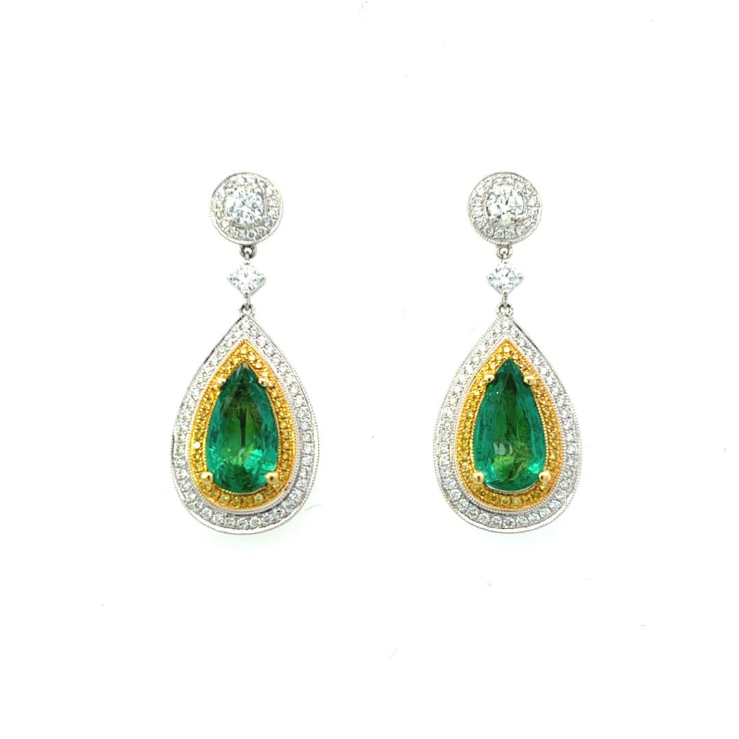 18K Yellow And White Gold Pear Shape Emerald And Fancy Yellow Diamond Double Halo Drop Earrings (5.55ctw)