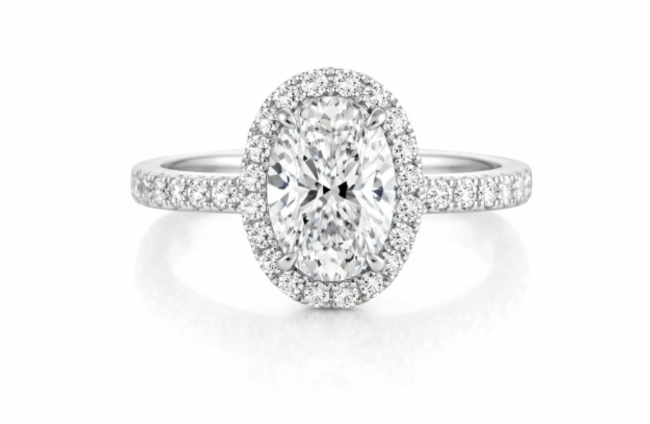 White Gold .70ct Oval Diamond Halo Engagement Ring