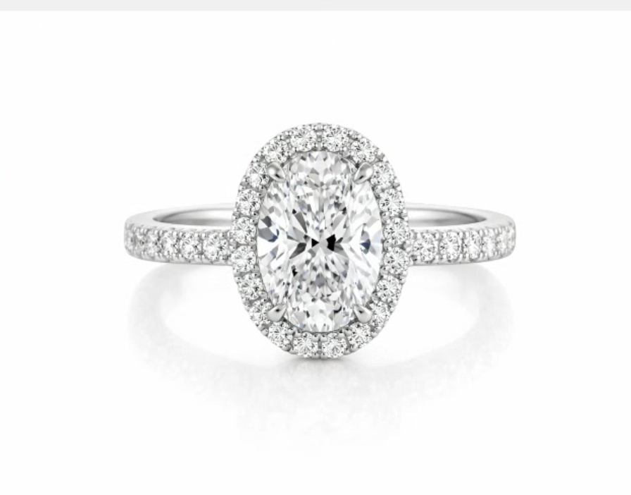 1.15 CTW Oval Diamond Halo Engagement Ring in 14K White Gold