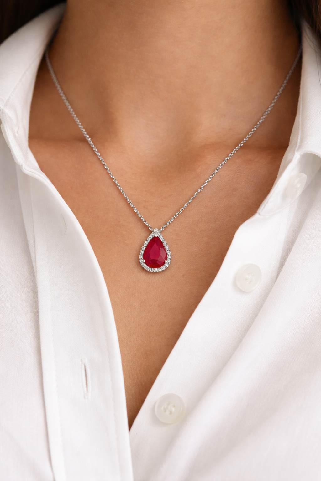 18K White Gold Pear Shape Burmese Ruby Pendant With Diamond Halo
