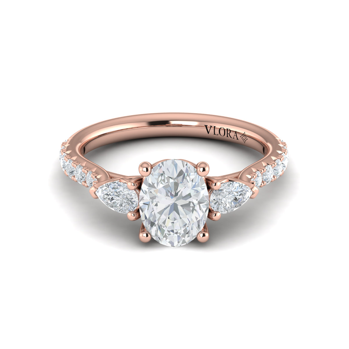 18kt Rose Gold Pear & Oval Three Stone Diamond Engagement Ring