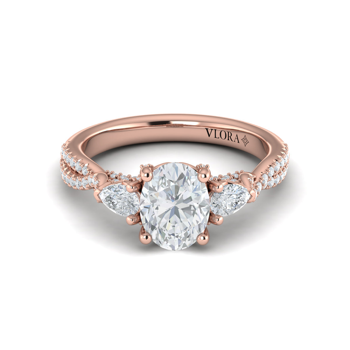 18kt Rose Gold Pear & Round Diamond Three-Stone Ring