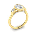 14kt Yellow Gold Oval Diamond Three-Stone Bezel Ring